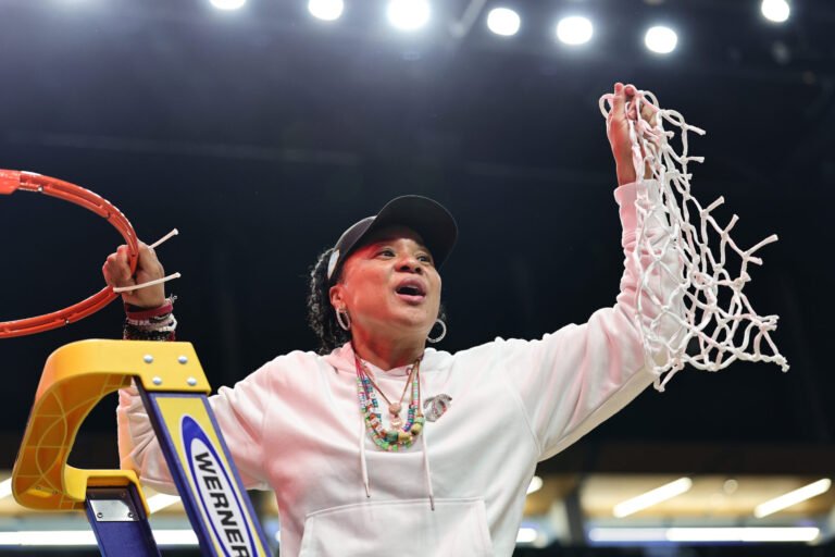 South Carolina Basketball Trainer Crack of dawn Staley Venerated with a Statue